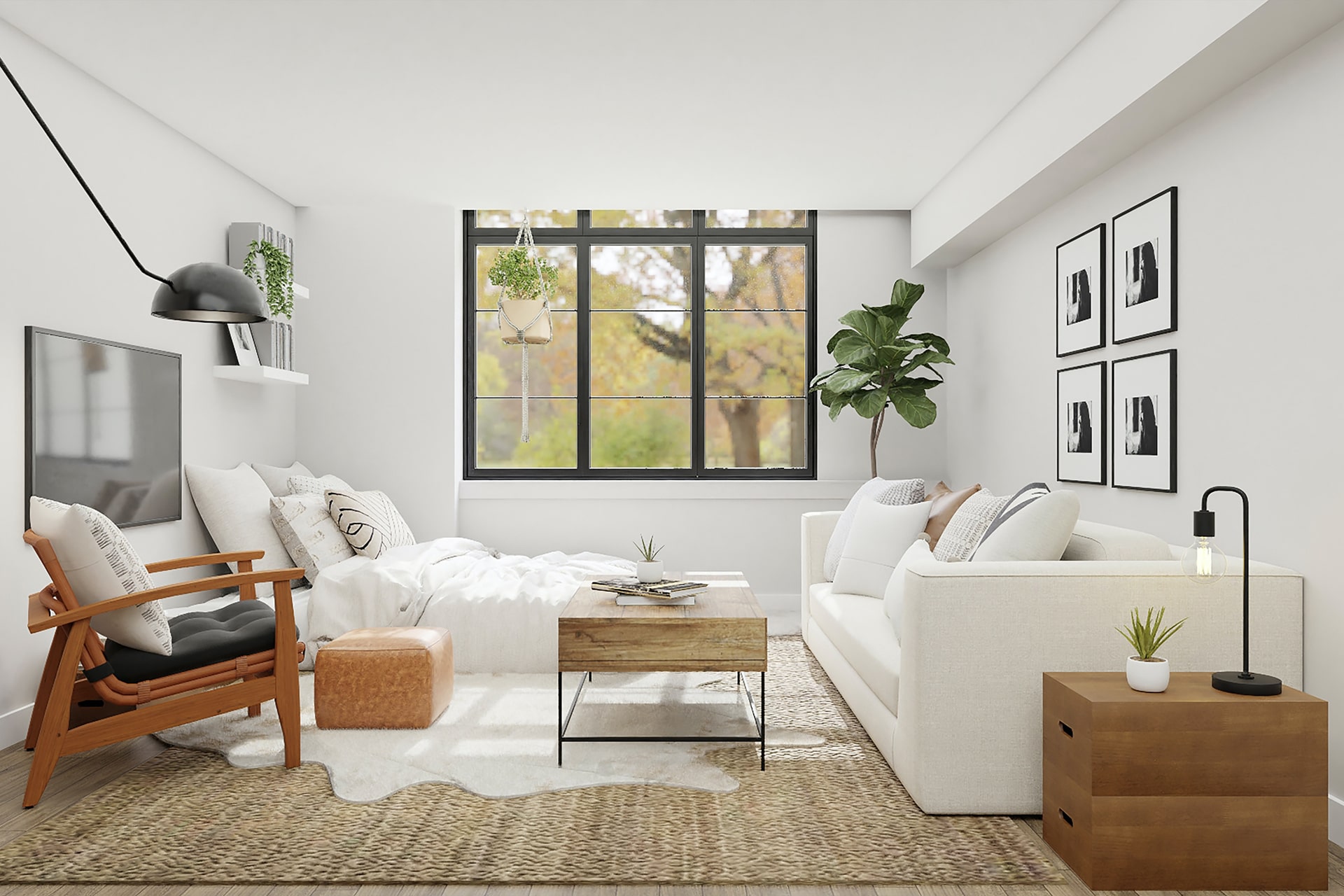 白い壁の広いワンルームの写真